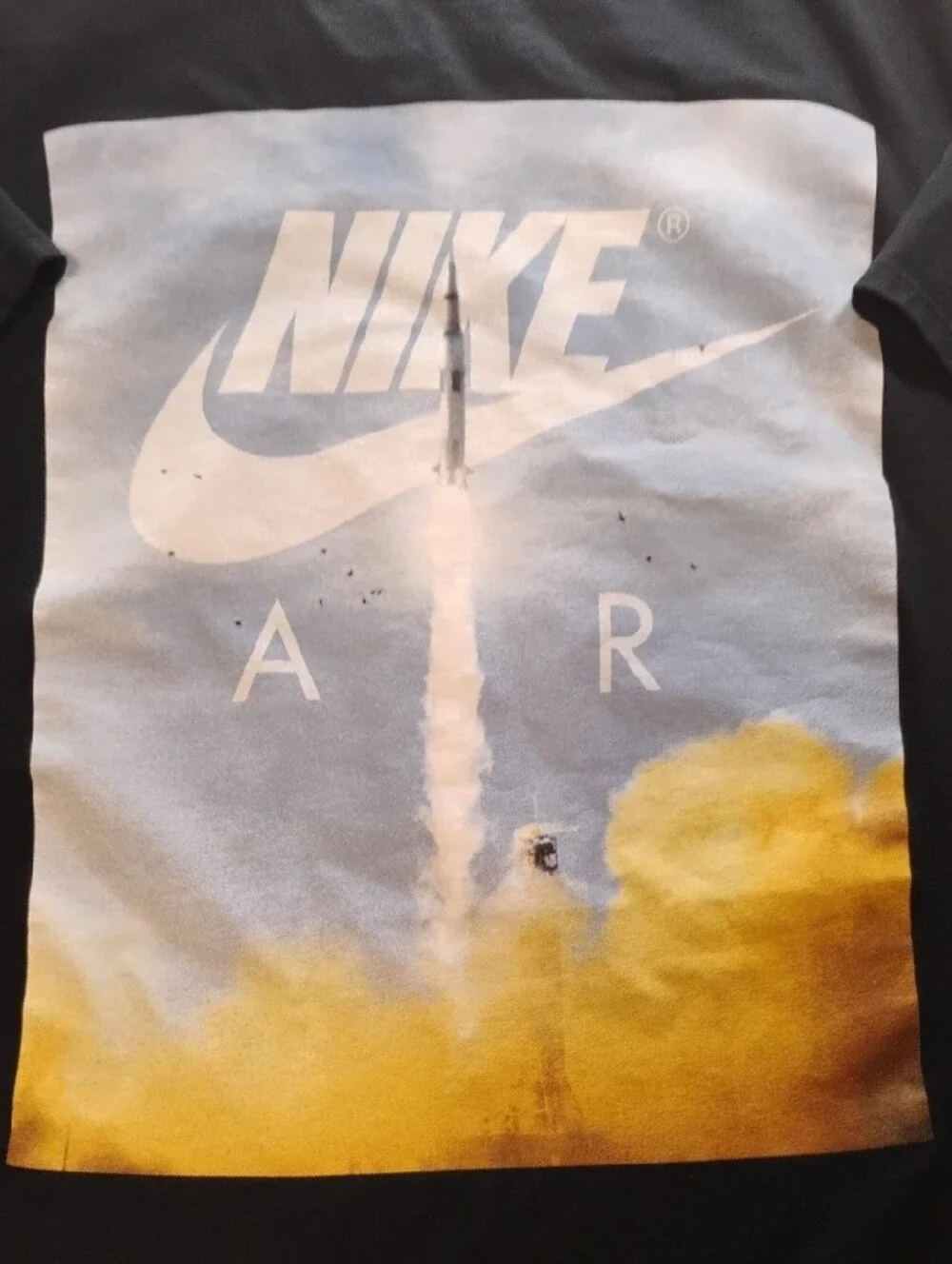 Nike Black T-Shirt with Blue Sky and Yellow Smoke Graphic